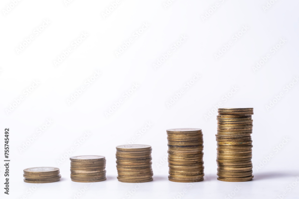 Stacks of coins isolated on white background, business and finance concept Stacks of coins isolated on white background, business and finance concept