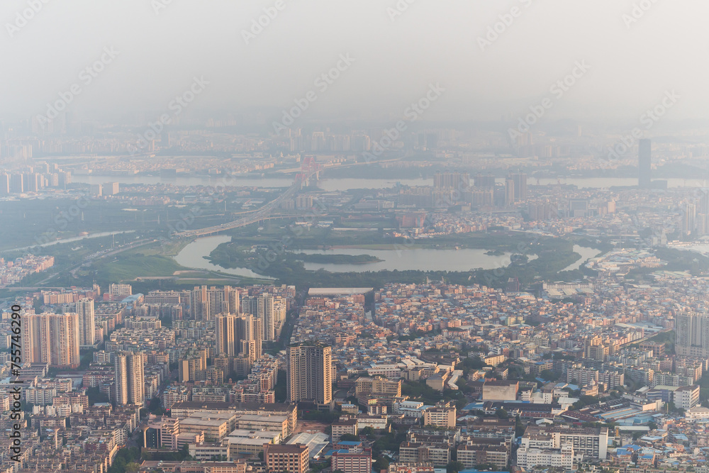 Guangzhou city, Zhujiang river with bridge in fog, China, aerial view