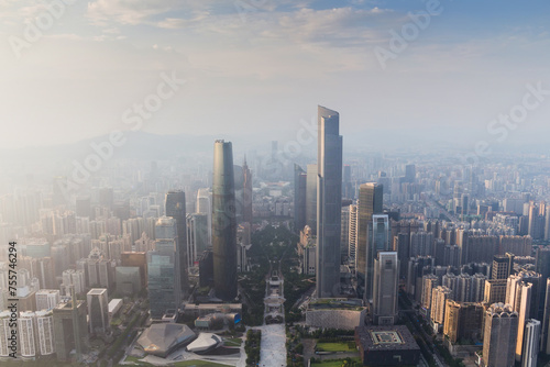Guangzhou city in fog at sunny morning at summer day  aerial view  China