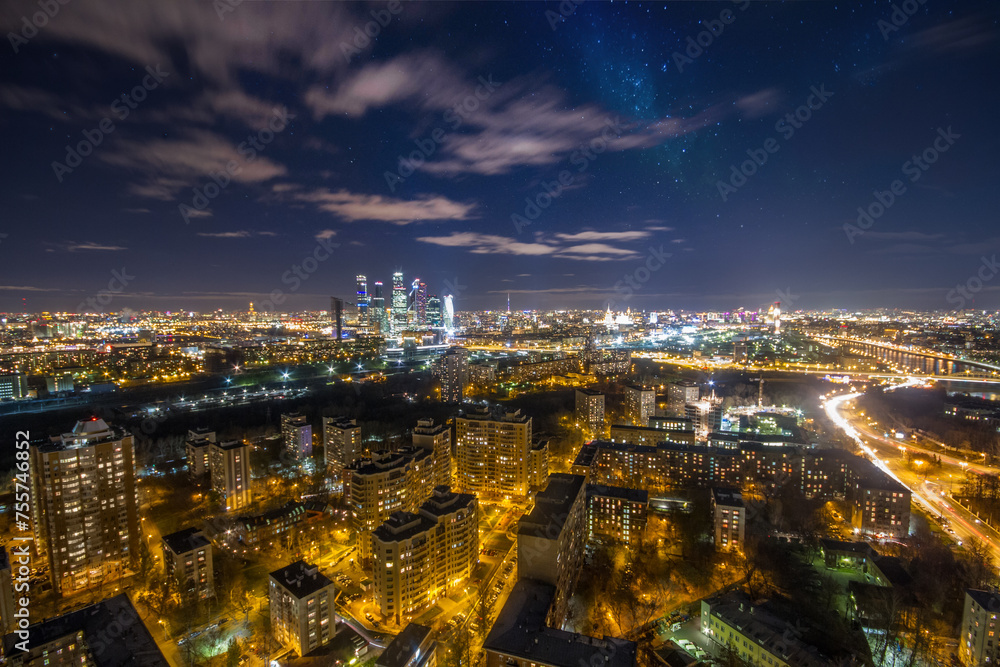 Night view of residential district with illumiantion and starry sky in Moscow, Russia