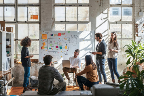 A group of people are gathered around a white board with a map on it