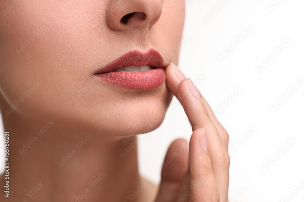 Woman with beautiful lips on white background, closeup Woman with beautiful lips on white background, closeup
