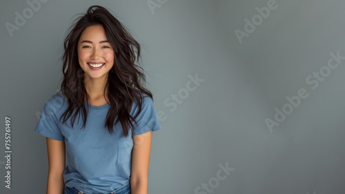 Asian woman wear blue t-shirt smile laugh out loud isolated