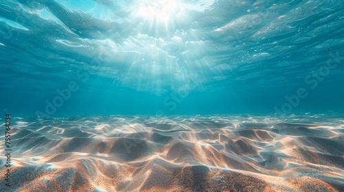 Seabed sand with blue tropical ocean above and sunny blue sky © Media Srock