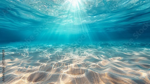 Seabed sand with blue tropical ocean above and sunny blue sky