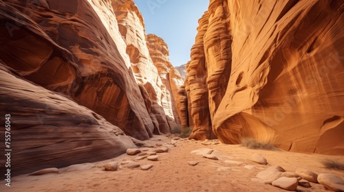 A rugged, canyon landscape with narrow slot canyons