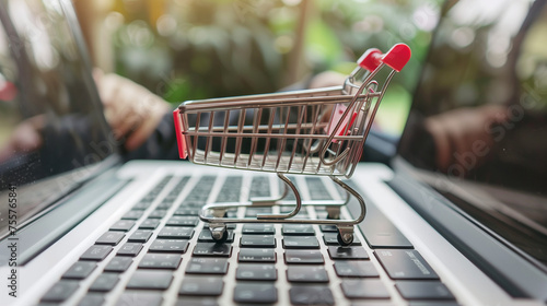 Online shopping e-commerce and customer experience concept: cashiers with shopping cart on a laptop keyboard, depict shopper consumers buy or purchase goods and services at home or office. Shopping. 
