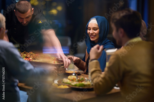 In a heartwarming scene  a professional chef serves an European Muslim family their iftar meal during the holy month of Ramadan  embodying cultural unity and culinary hospitality in a moment of shared