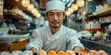 Handsome Japanese sushi chef in a restaurant kitchen, confidently preparing a gourmet dish.