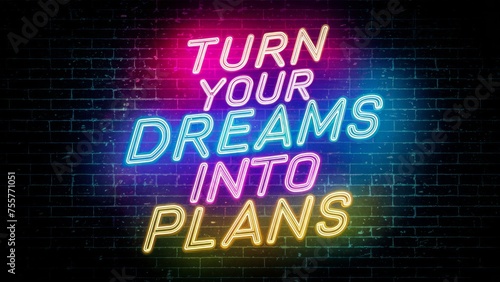 A vibrant neon sign that reads Turn Your Dreams Into Plans against a dark brick wall background, embodying motivation and positivity