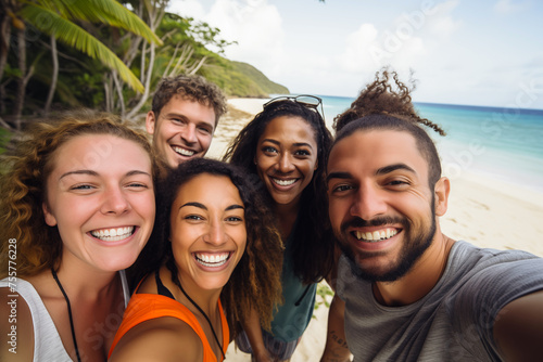 Group of friends having fun on beach, multiracial or diverse friends on vacation, Smiling people taking selfie on tropical island © Miro Nenchev