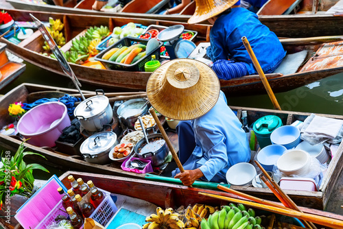 Traditional floating market in Damnoen Saduak near Bangkok, Thailand. photo