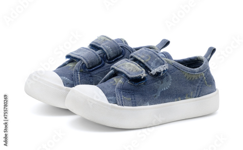 Unbranded fashion stylish walking kid shoes or baby velcro sneakers isolated on white background.