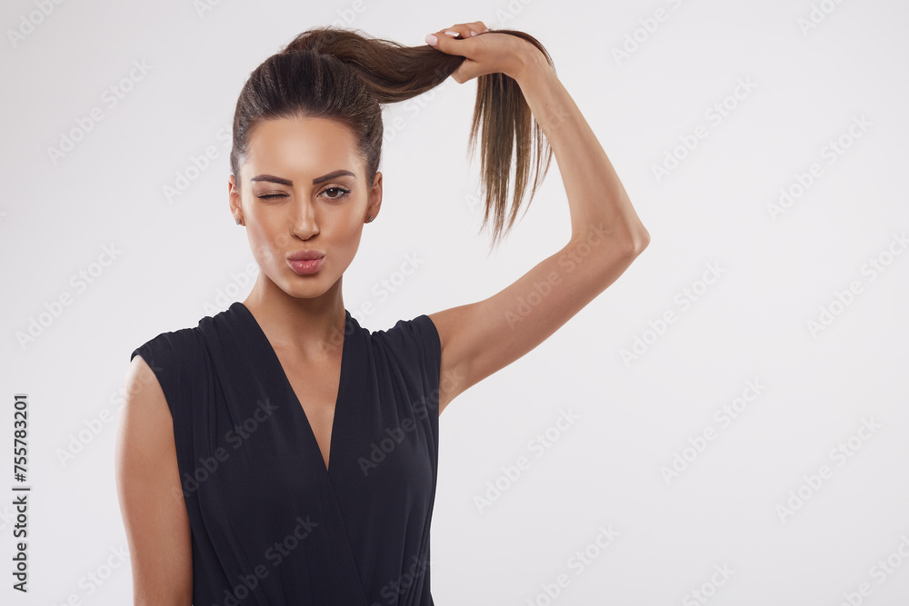 Portrait of woman with beautiful long hair. Beauty model girl with brown straight long hair. Care and hair products Portrait of woman with beautiful long hair. Beauty model girl with brown straight long hair. Care and hair products