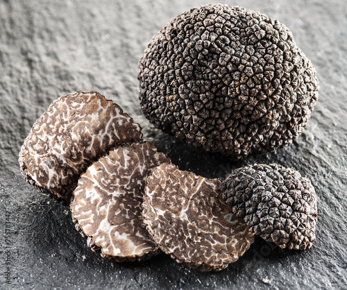Summer truffles and truffle slices isolated on white background. Close-up.