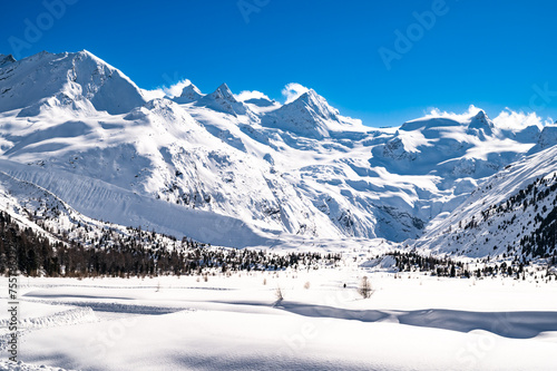 Wallpaper Mural Val Roseg, in Engadine, Switzerland, in winter, with snow-covered cross-country ski slopes. Torontodigital.ca
