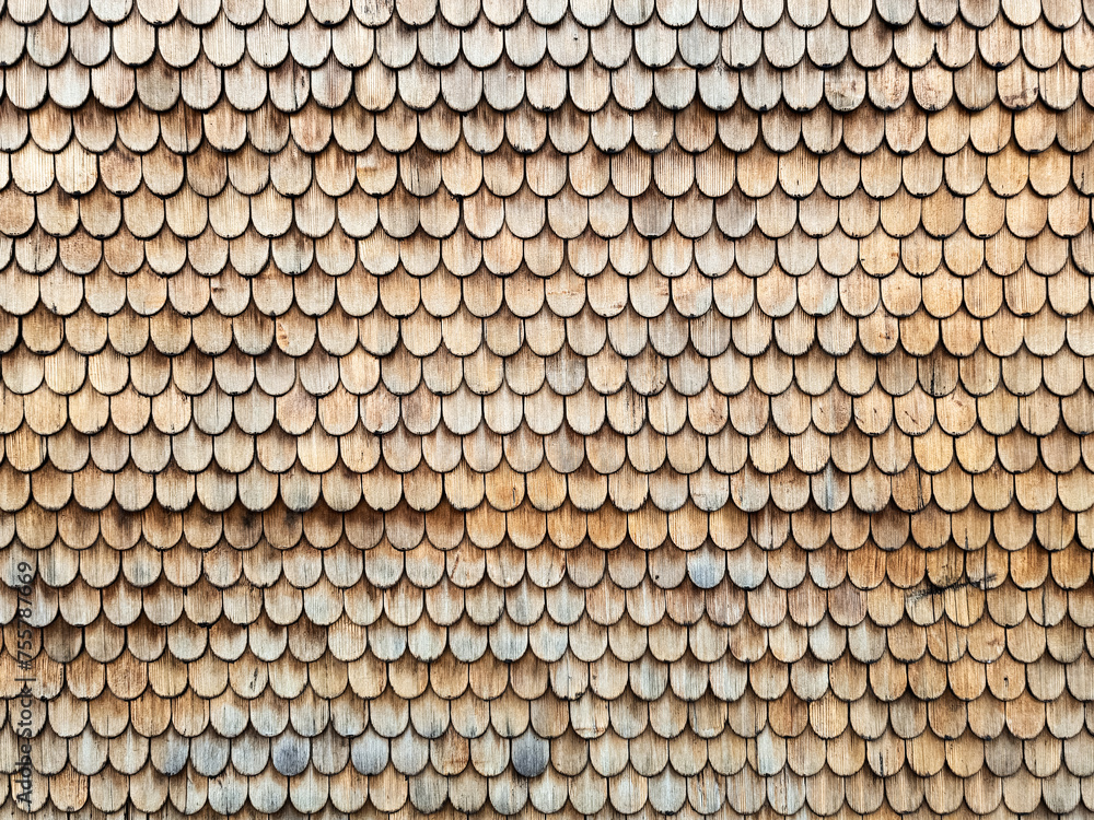 Fish-scale shingles tiled Swiss chalet wall