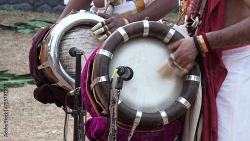 Drum artists playing Thavil, a South Indian percussion musical instrument photo