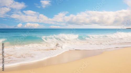 A serene beach with golden sand meeting the ocean