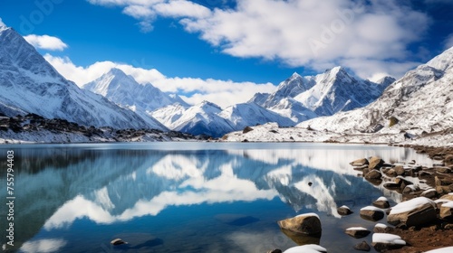 A serene lake surrounded by snowcapped peaks