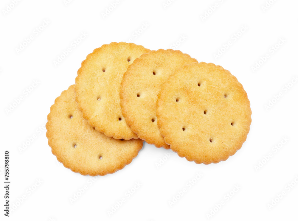 Many crispy crackers isolated on white, top view. Delicious snack Many crispy crackers isolated on white, top view. Delicious snack