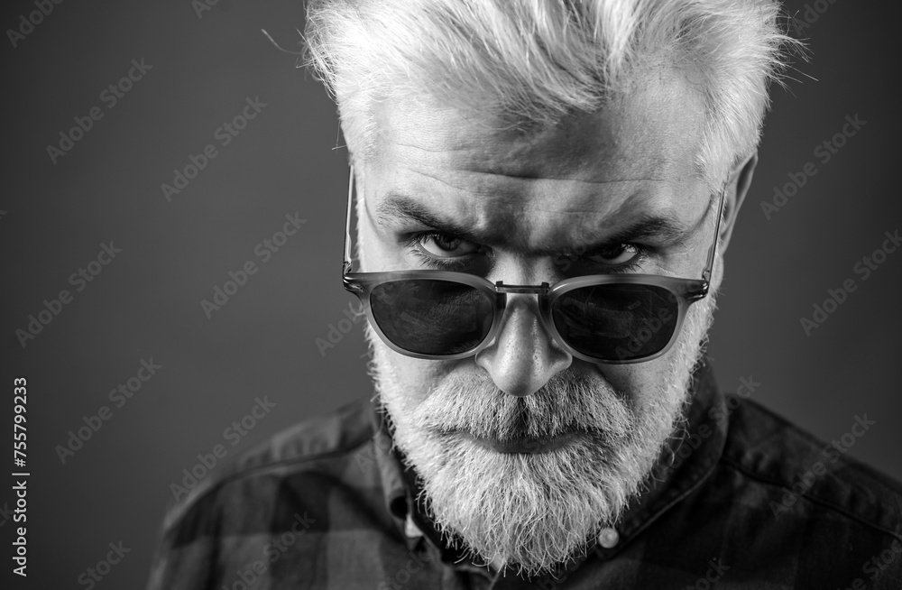 Sexy gorgeous stylish man. Handsome man with a beard. Mens fashion concept. Sexy gorgeous stylish man. Handsome man with a beard. Mens fashion concept.