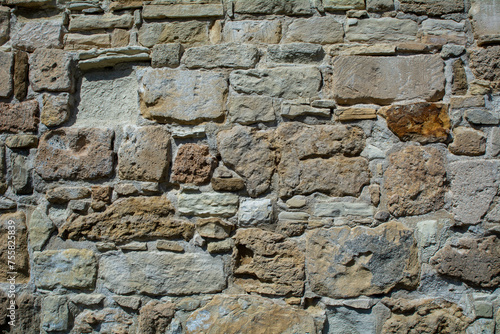 Obraz na płótnie Close-up of a brown stone wall. Background image with copy space w salonie