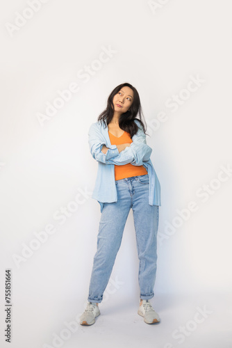 Beautiful young Asian woman standing in full body in casual wear. Happy face, a confident, beautiful woman isolated on a white background.