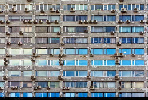 Apartment prefabricated building in Russia with many air conditioning units on the facade.