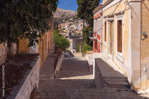 Old narrow traditional street in the Greek village of Symi.