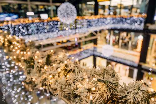bustling holiday spirit comes alive in the vibrant atmosphere of the Christmas market, where shoppers delight in festive decorations and colorful displays.