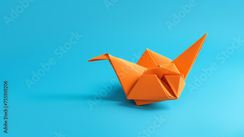orange origami bird flying on a blue background сreated with Generative Ai