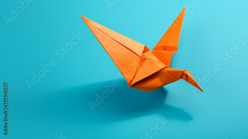 orange origami bird flying on a blue background сreated with Generative Ai