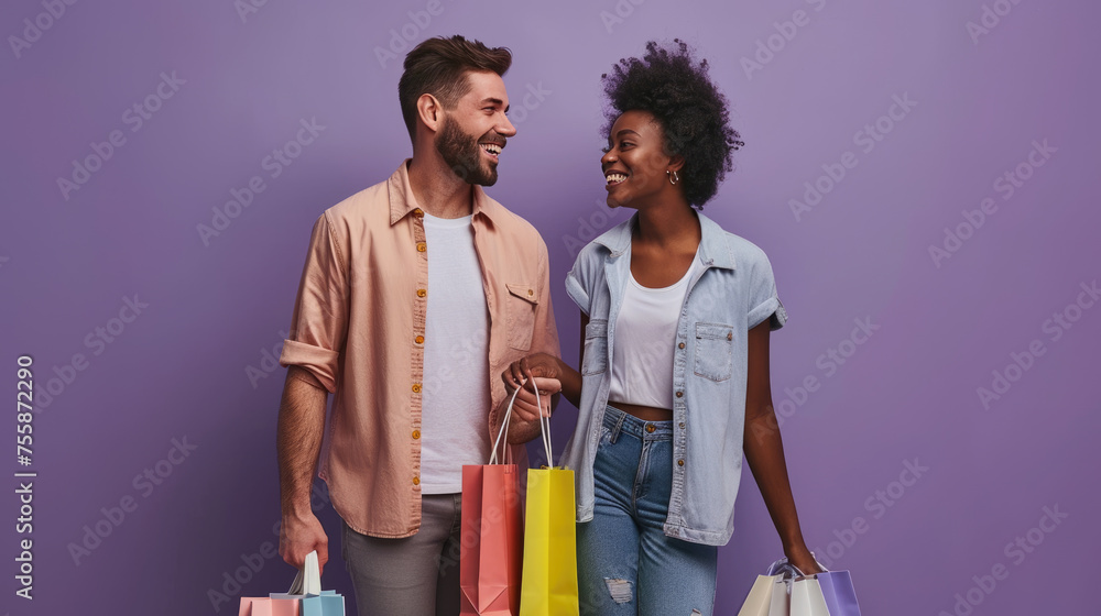 Happy couple holding hands and carrying colorful shopping bags, suggesting they have been shopping together, with a plain purple background - obrazy, fototapety, plakaty 