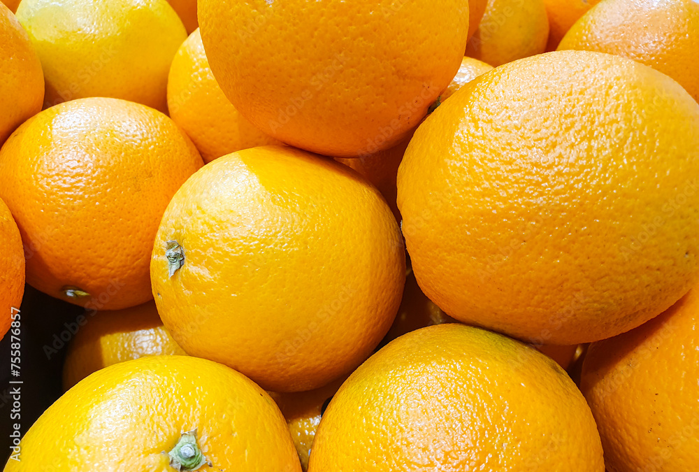 Orange fruit background. Ripe natural oranges fruit. Orange fruit background. Ripe natural oranges fruit.