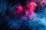 Colored powder explosion. red blue and pink colors. The smoke is in the air and is scattered in different directions