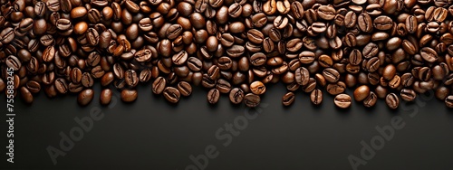 Pile of Coffee Beans on Table © Jorge Ferreiro
