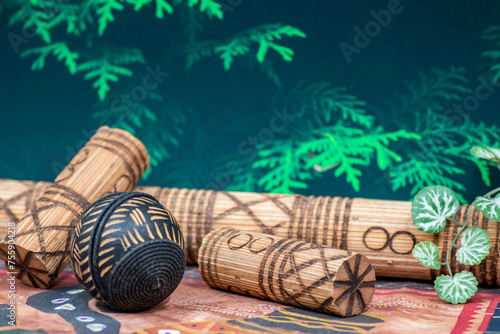 Musical traditional ethnical and tribal rhythmic idiophones made of wood with some grains or send inside, when shacked makes sound, perfect for keeping rhythm of the song, very popular in Africa