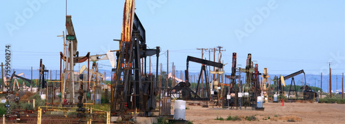 Oil Pump Jacks Amidst Super Bloom: 4K Ultra HD Image of California Fields