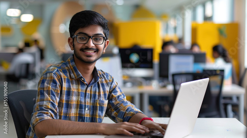 Dynamic portrait of a young Indian tech innovator at a start-up hub