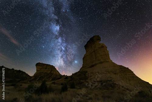 Night panorama with the Milky Way over the Monegros desert, Zaragoza, with the Tozal El Solitario under the stars
