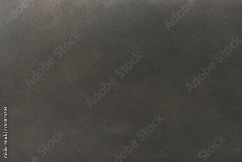 Abstract background made of colored metal close-up.