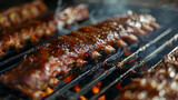 Close up of ribs cooking on a grill