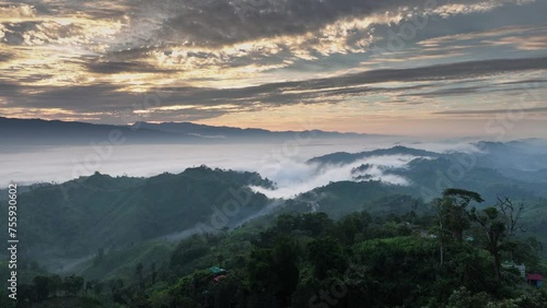 Clouds drifting over the majestic mountains in Sajek Valley, a breathtaking journey through nature's serene beauty. Timelapse, 4k Drone footage