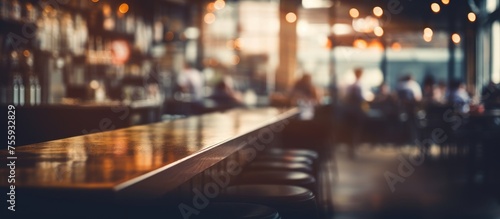 Blurry coffee shop or restaurant image with vintage bokeh background.