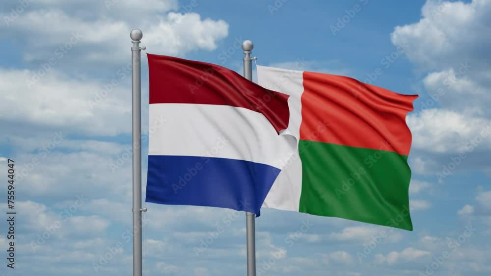Madagascar and Netherlands two flags waving together, looped video, two country relations concept Madagascar and Netherlands two flags waving together, looped video, two country relations concept