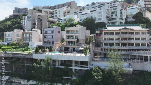 Drone Aerial Skyview shot of the Premium Villa independent house and beach seaside residential area in Repulse Bay Shouson Hill Stanley Sham Wan Aberdeen Hong Kong Island photo