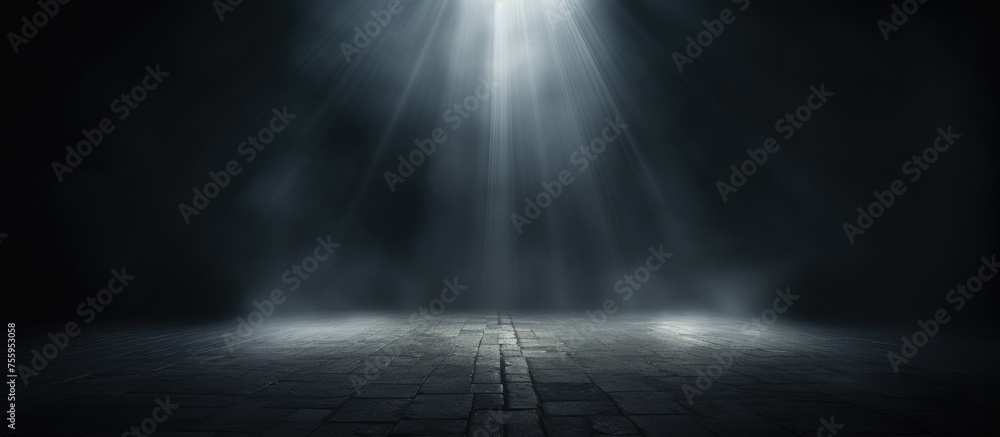 In a dark room, a spotlight illuminates a wooden floor creating a dramatic atmosphere. The contrast between the darkness and the bright light creates a lens flare effect - obrazy, fototapety, plakaty 