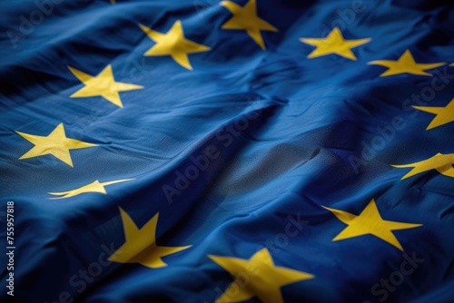 Detailed view of the European Union flag, featuring a circle of 12 gold stars on a blue background.