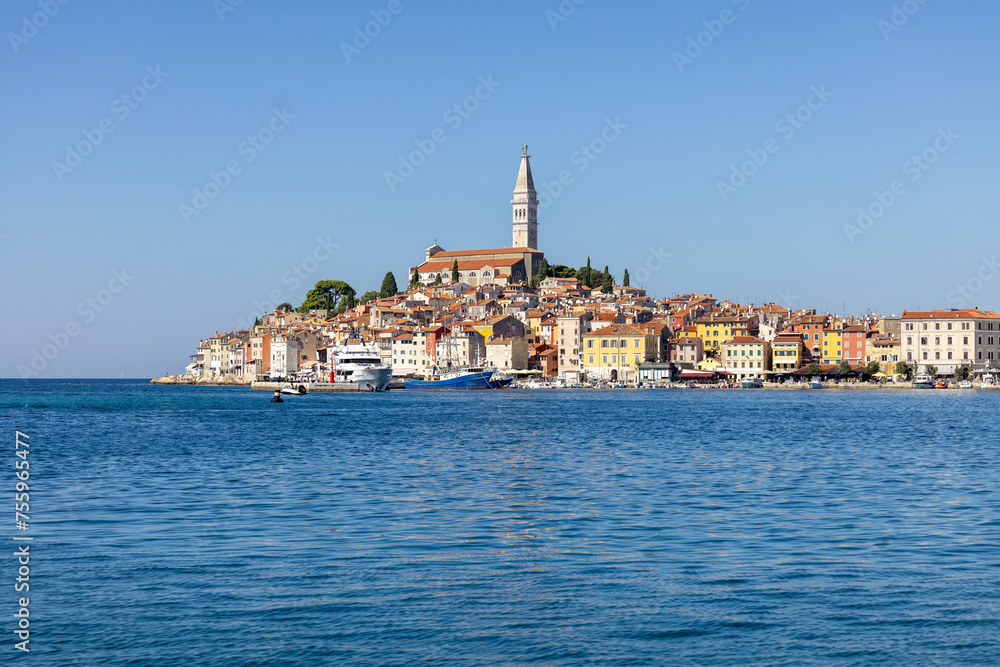 View from the Adriatic Sea to peninsula with the Old Town and tower of Saint Euphemia Church, Rovinj, Croatia, Istria